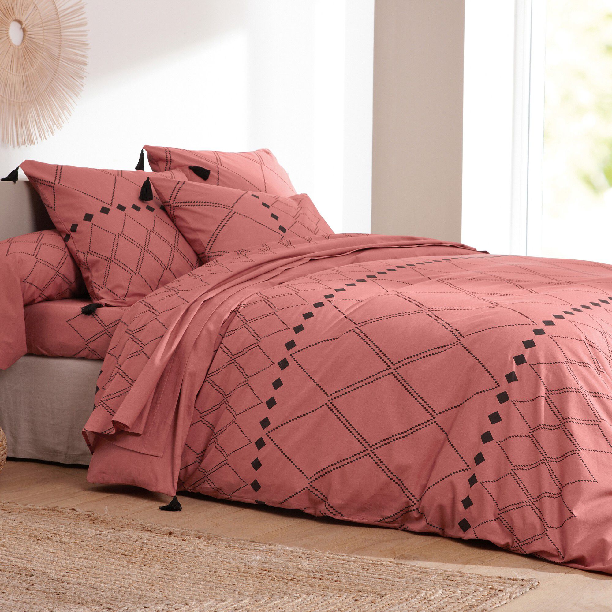 Linge de lit Massaï coton à motifs graphiques et finitions pompons