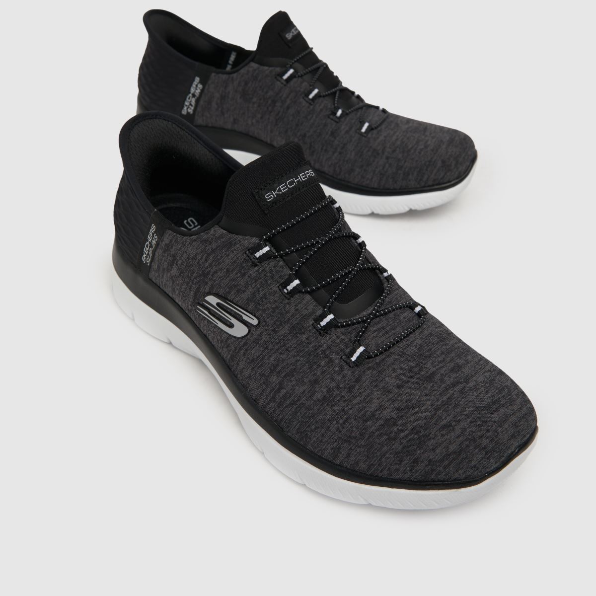 SKECHERS – Svarta och vita slip-ins – Summits – Sneakers