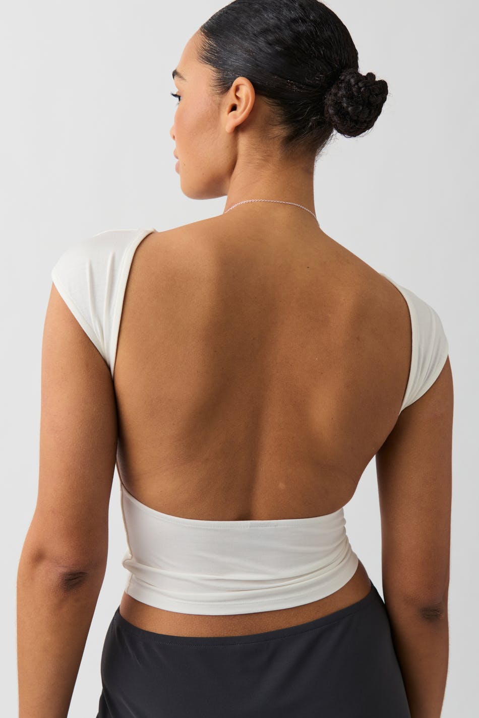Soft touch open back top