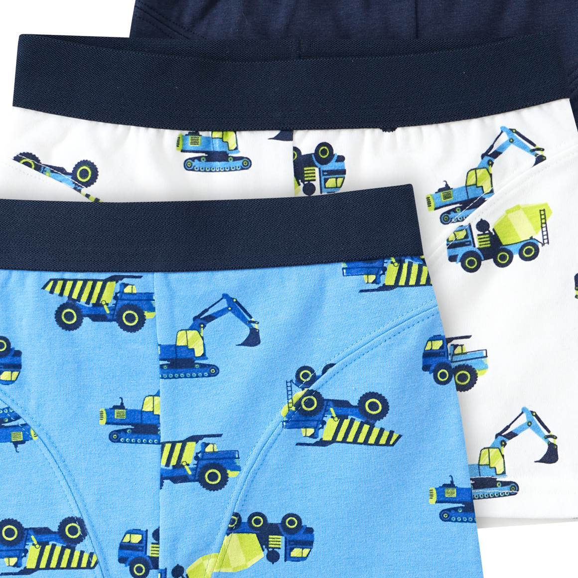 3 Jungen Boxer mit Baustellenfahrzeugen