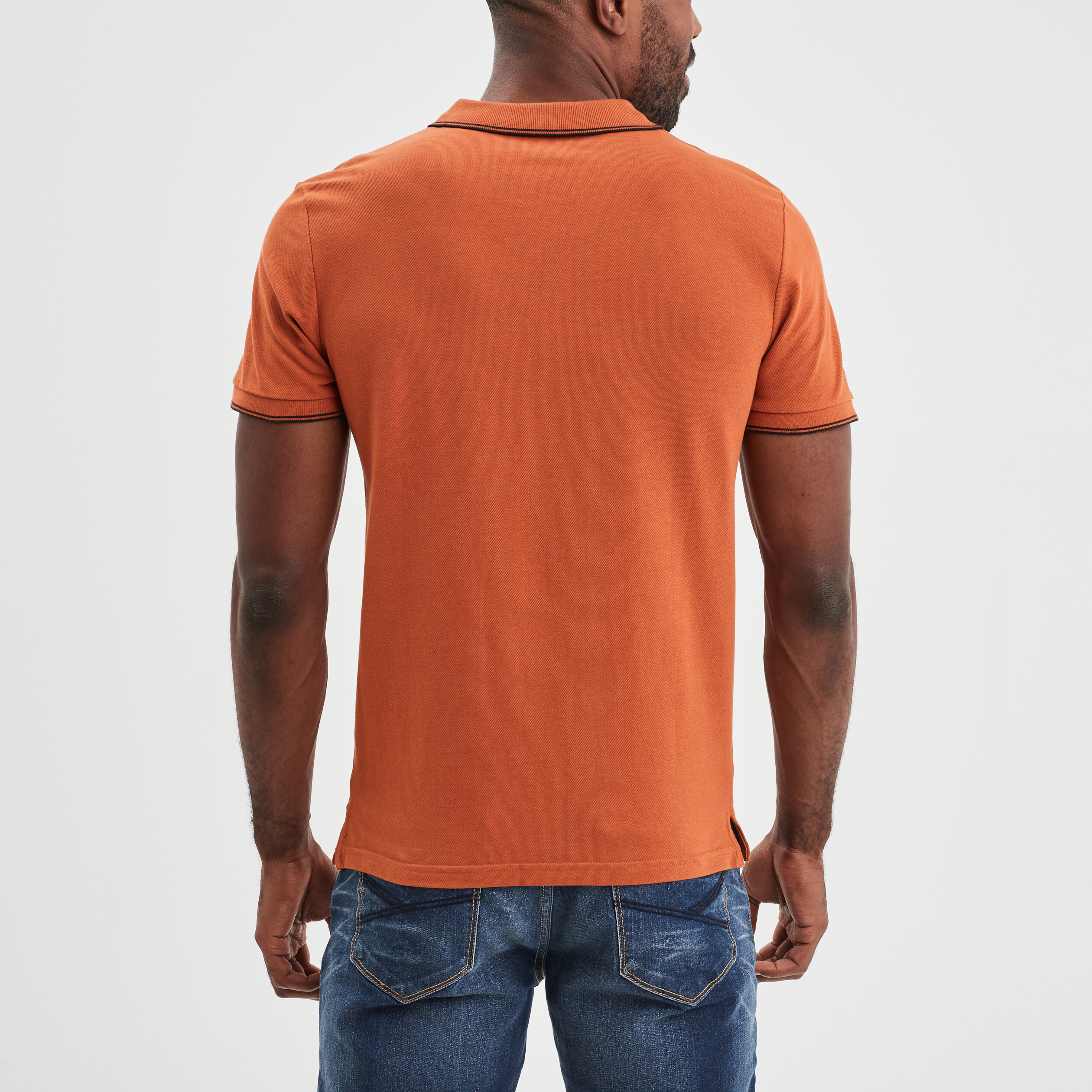 Polo manches courtes bords contrastés orange foncé homme | La Halle