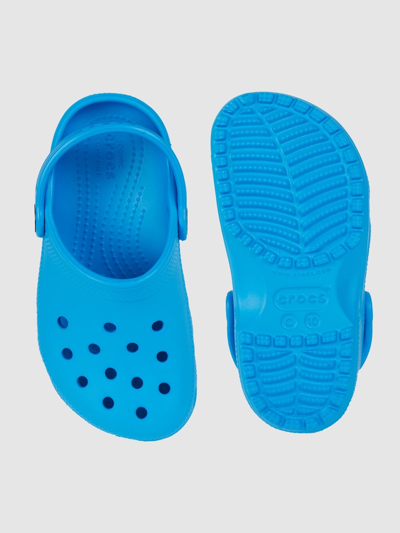 Clogs mit Fesselriemen in ozean blau