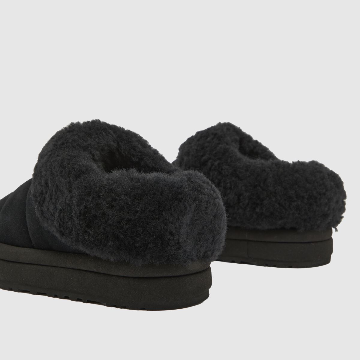 UGG svarta tazzlita Junior tofflor