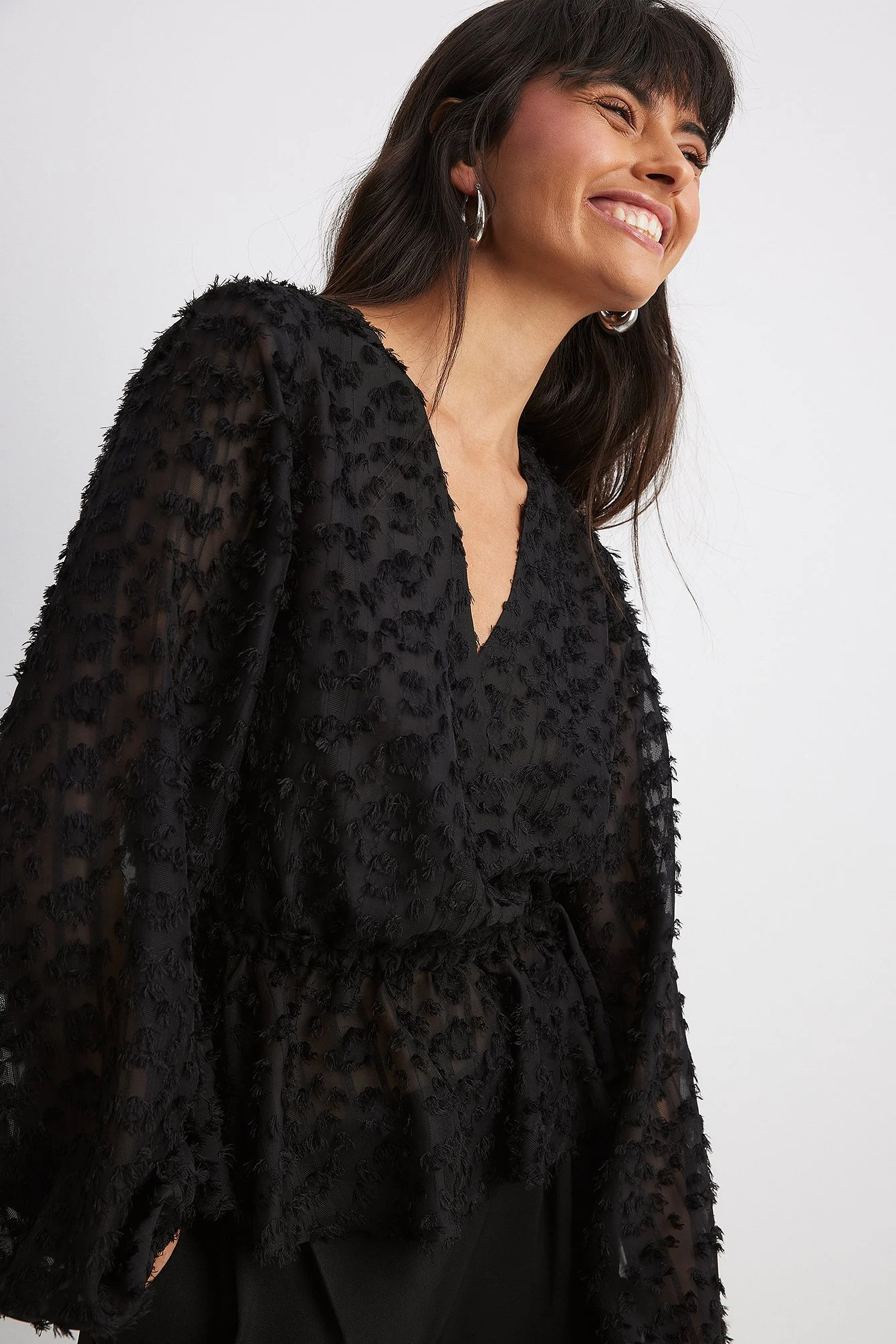 Taillierte Bluse aus texturiertem Chiffon