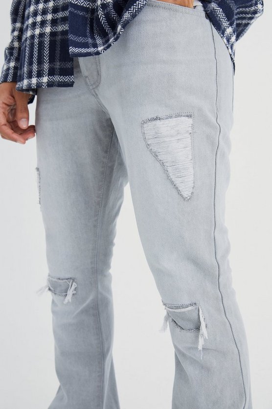 Slim-Fit Schlagjeans mit Rissen