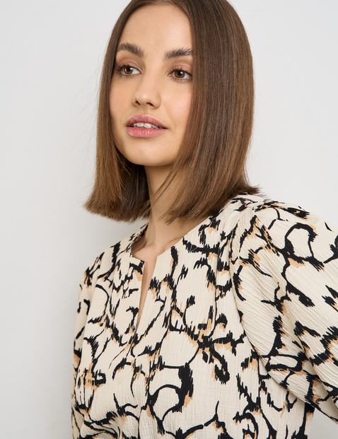Kleid mit Puffärmeln