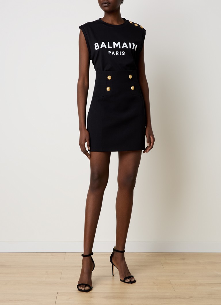 Mini spódniczka Balmain z dziewiczej wełny z ozdobnymi guzikami.