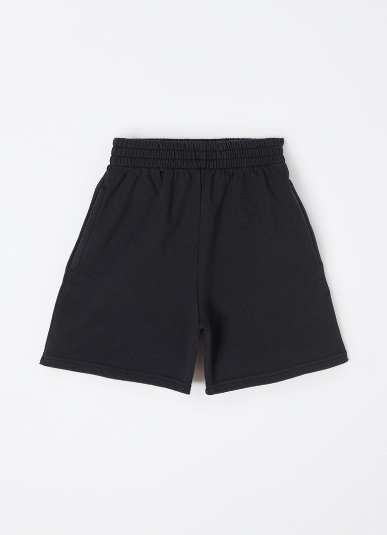 Calções de treino Balenciaga de cintura alta, corte reto e com bolsos laterais.