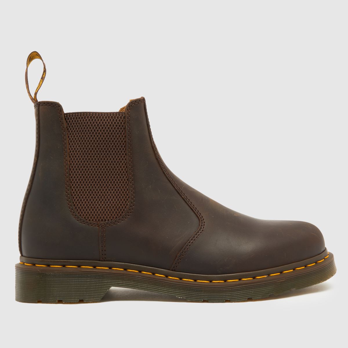 Dr Martens 2976 – Mörkbruna stövlar med gula sömmar
