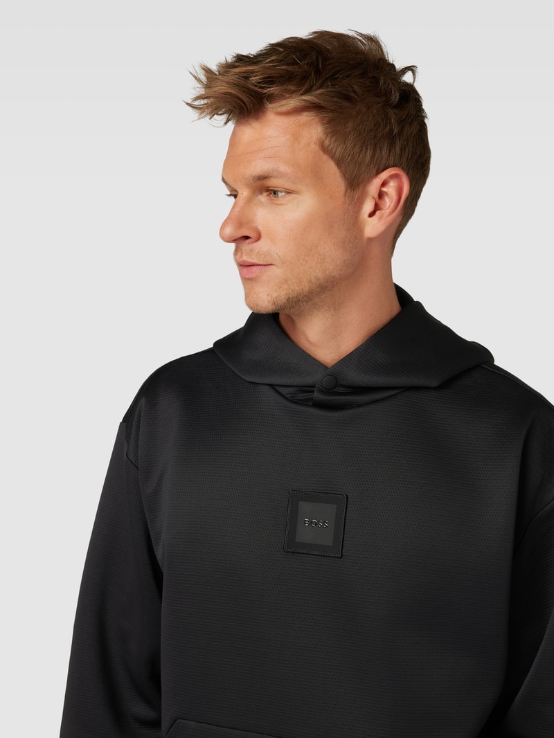 Hoodie mit Strukturmuster Modell 'Sly Lotus' in schwarz