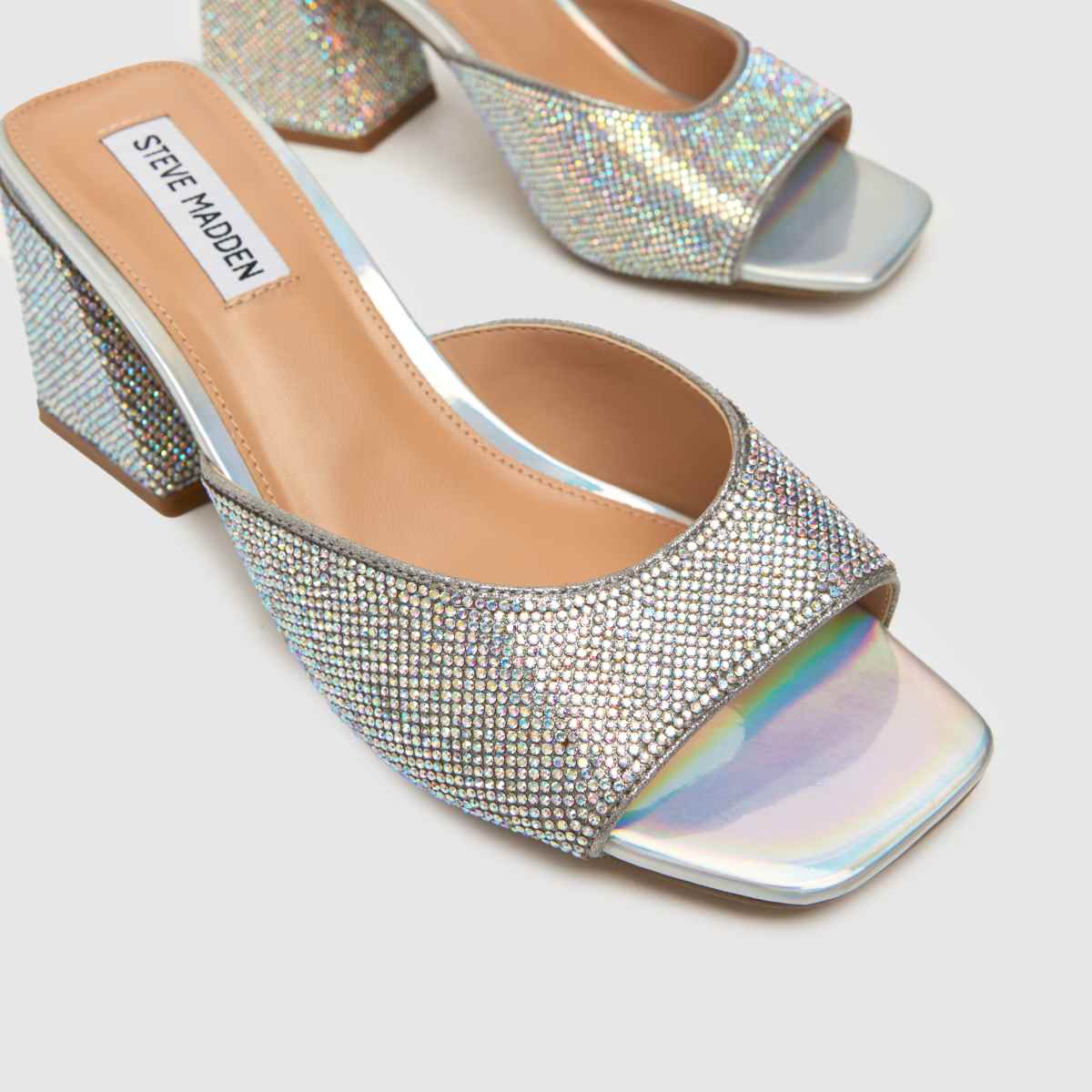 Steve Madden – Silverfärgade mules med hög klack och glödande klack