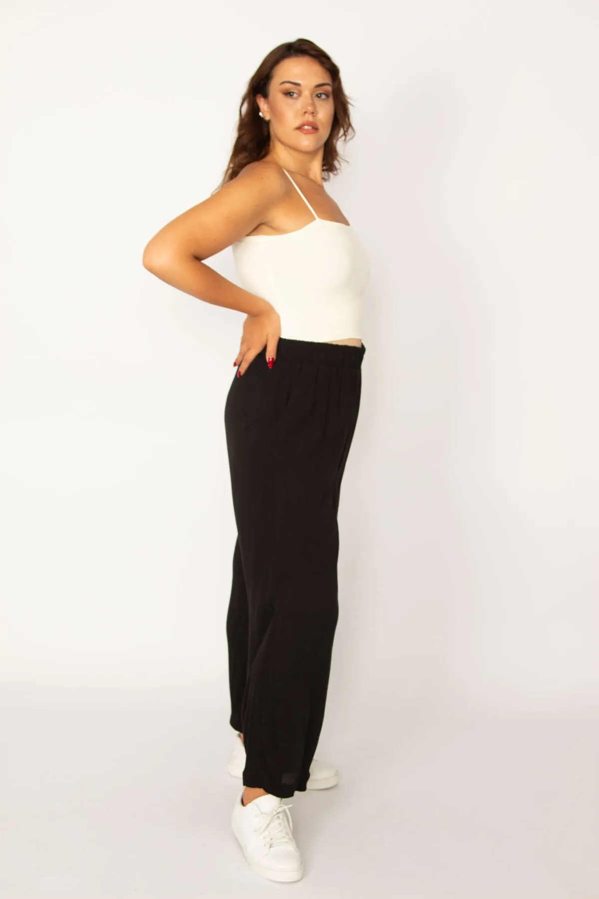 Şans  Damen-Hose aus schwarzem gewebtem Viskose-Stoff in gedrehter Größe mit elastischem Bund und Seitentaschen 65n33982