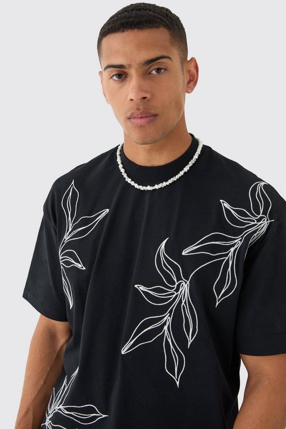 Kastiges Oversize T-Shirt mit floraler Stickerei