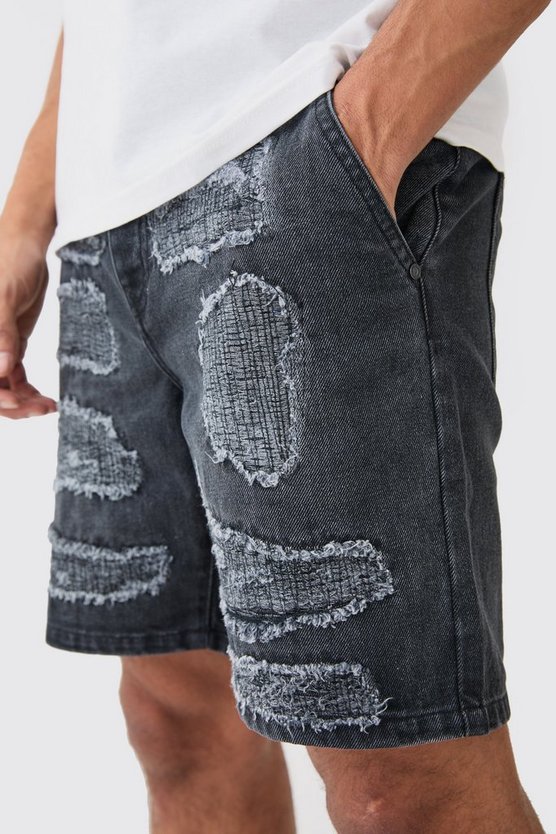 Reparierte Slim-Fit Jeansshorts in Schwarz