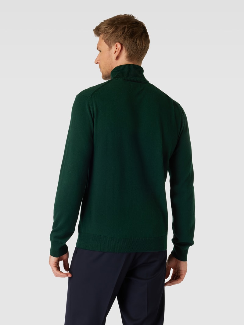 Rollkragenpullover mit Label-Stitching aus Baumwoll-Woll-Mix in dunkelgrün