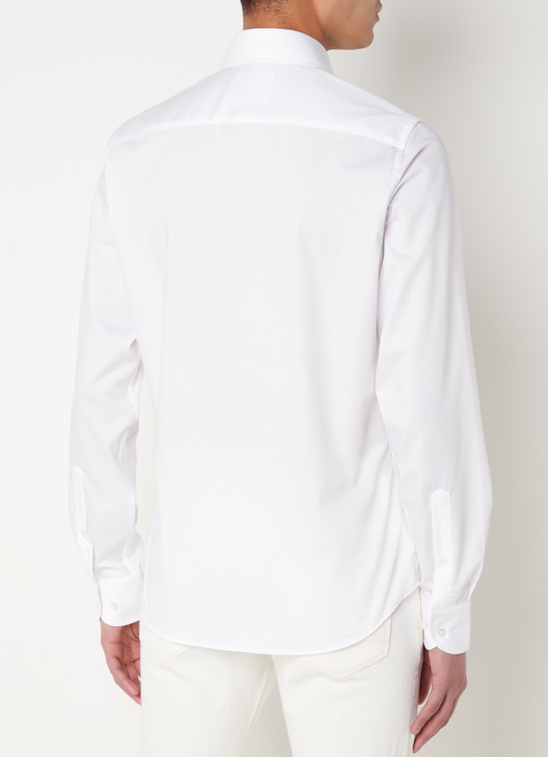 Camisa Profuomo branca, de corte slim, sem necessidade de passar a ferro e com mangas extralongas.