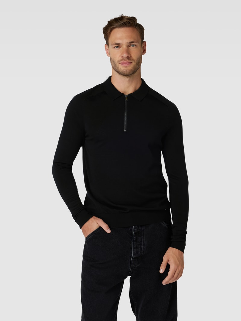 Pullover mit Polokragen aus Schurwolle in schwarz