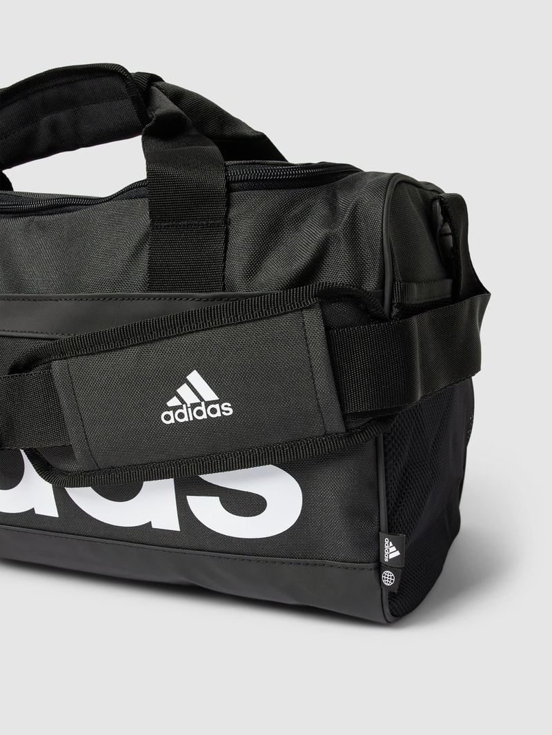 Duffle Bag mit Label-Detail Modell 'LINEAR DUFFEL' in schwarz