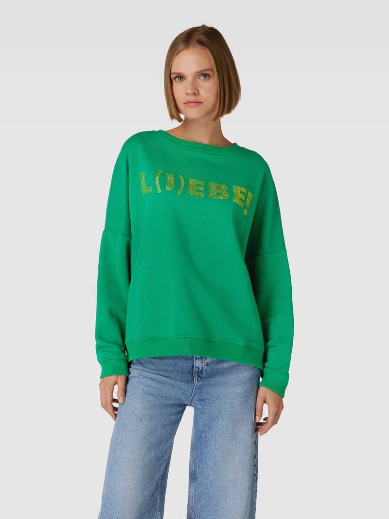 Sweatshirt mit Statement-Print Modell 'L(I)EBE!' in grün