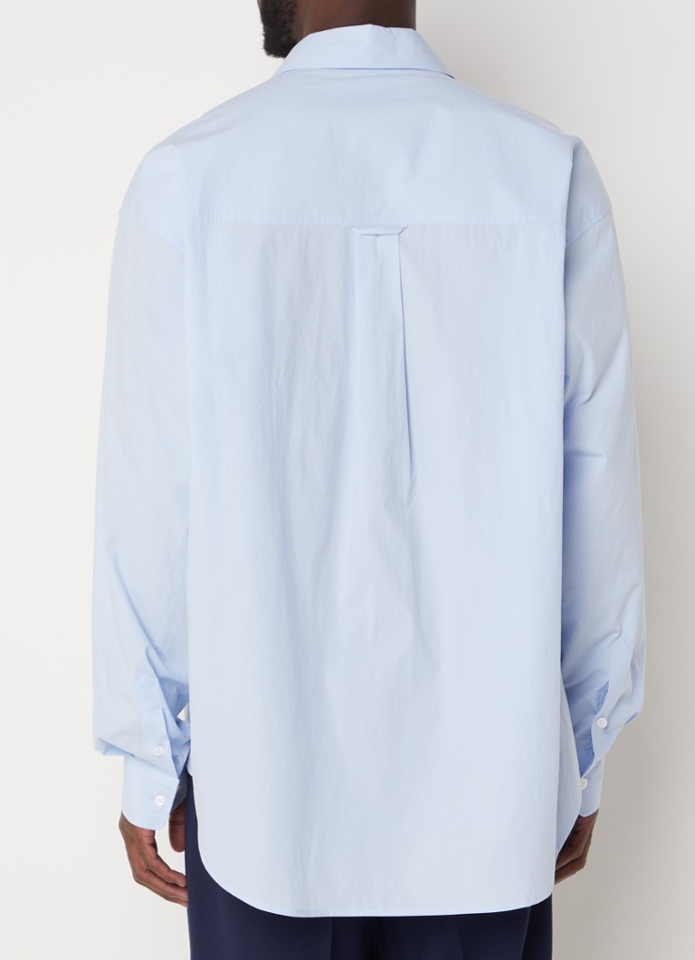 Camisa oversized Gus da Frankie Shop com bolsos no peito.