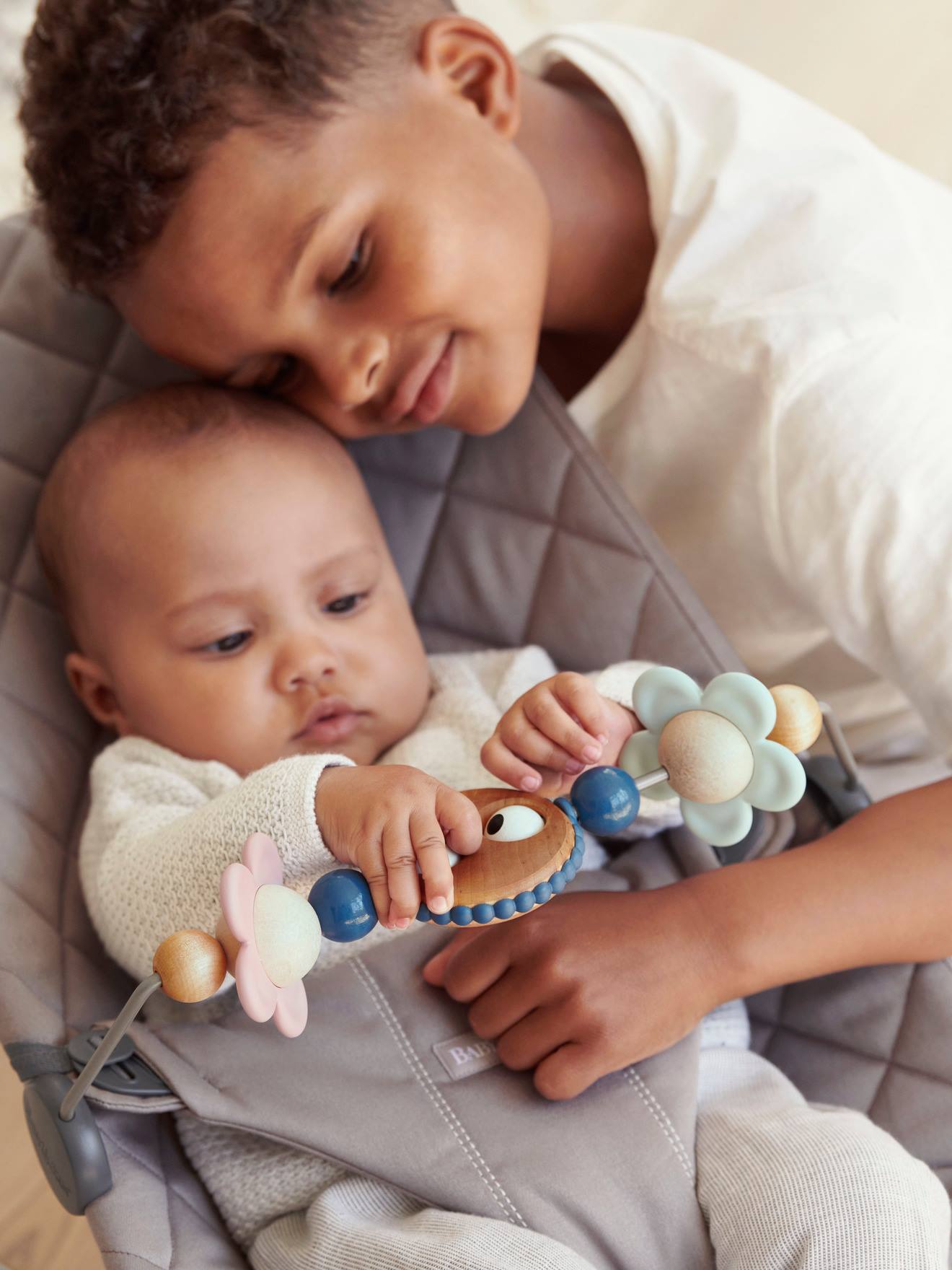 Arche de jeux BabyBjörn pour transat yeux espiegles pastels