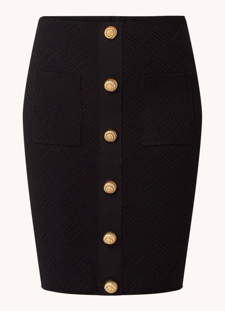 Gonna corta a tubino Balmain in maglia grossa con bottoni decorativi.