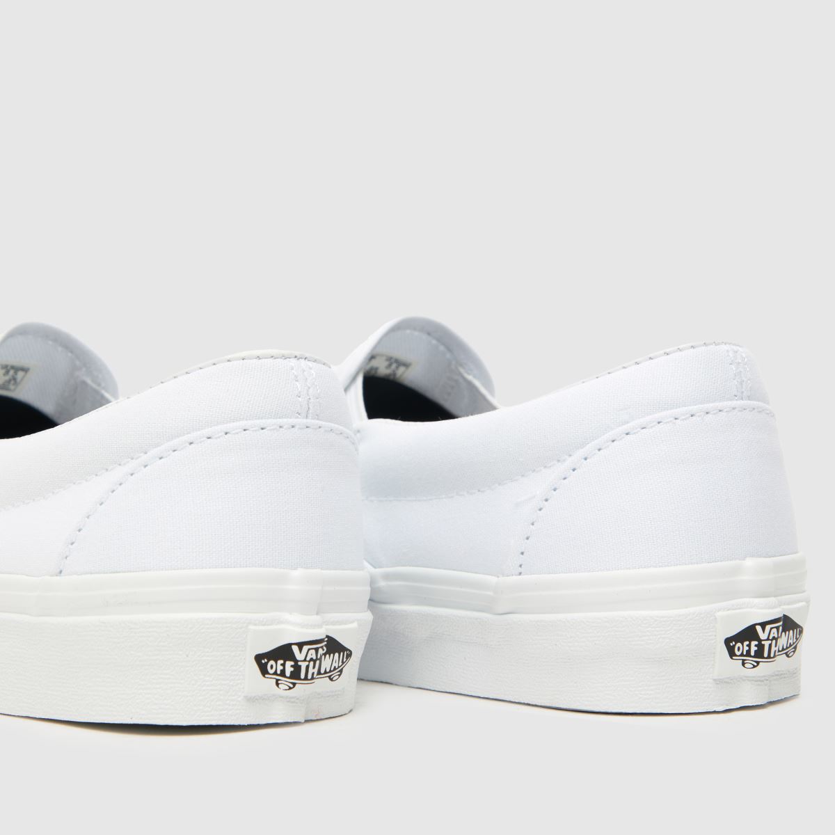 Vans – Vita klassiska slip-sneakers