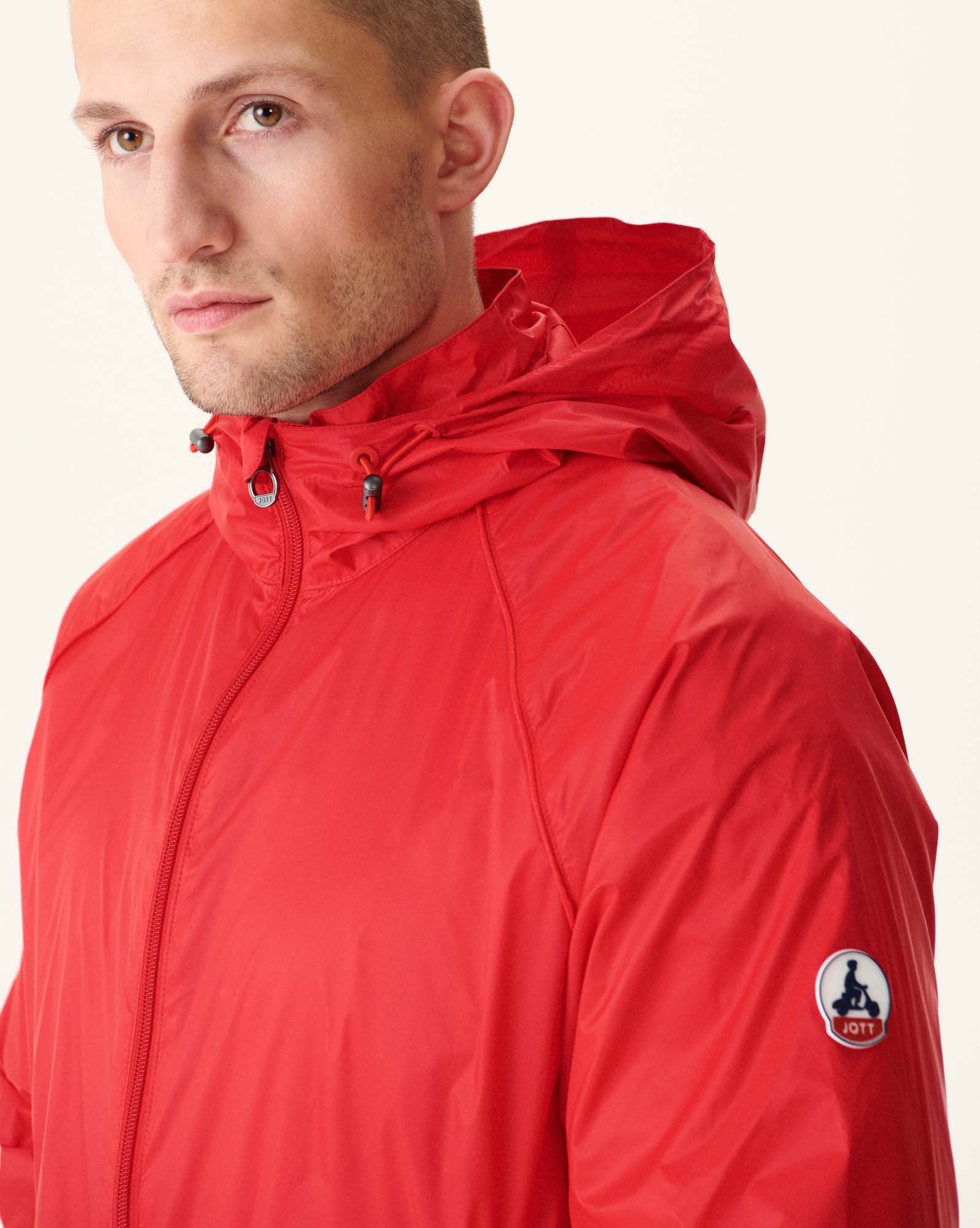 Coupe-vent à capuche Rouge vif Mistral