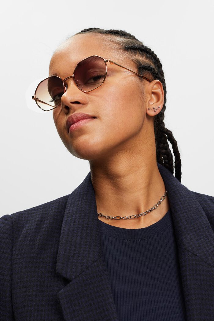 Sonnenbrille mit filigraner, goldener Fassung aus Metall