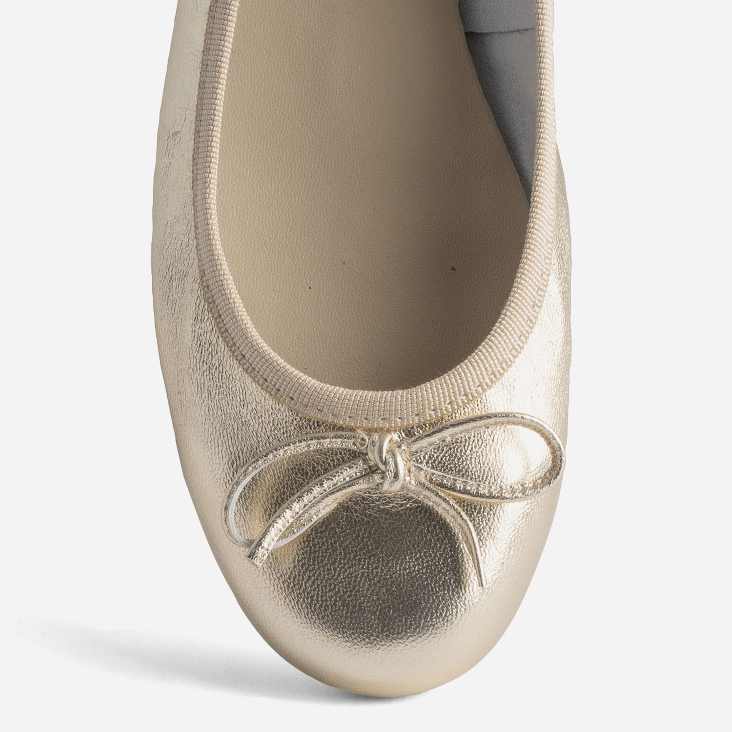 Ballerine dorée en cuir avec nœud
