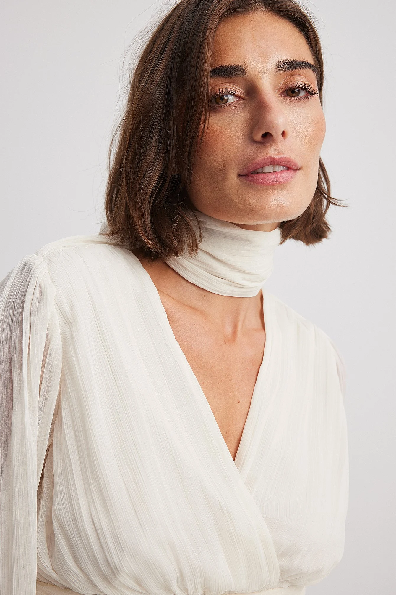 Bluse mit Ballonärmeln und Plissee-Detail