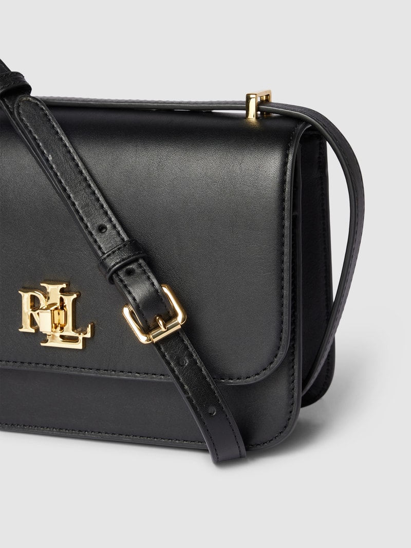 Schultertasche mit Label-Applikation in schwarz