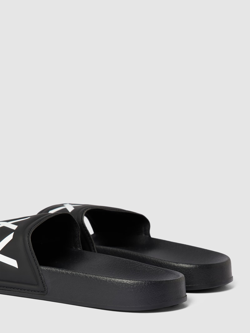 Slides mit Label-Detail Modell 'SLIPPY' in schwarz