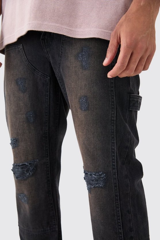 Lockere Jeans in gewaschenem Schwarz mit Riss am Knie