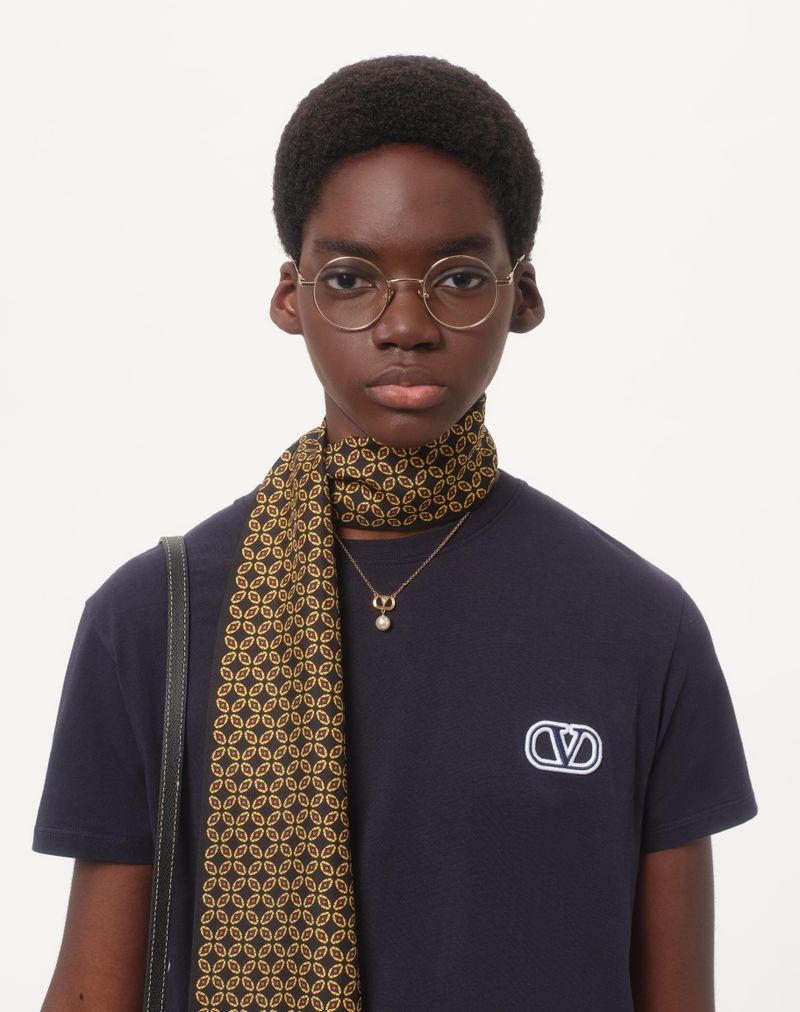 Camiseta de algodão com patch exclusivo Vlogo