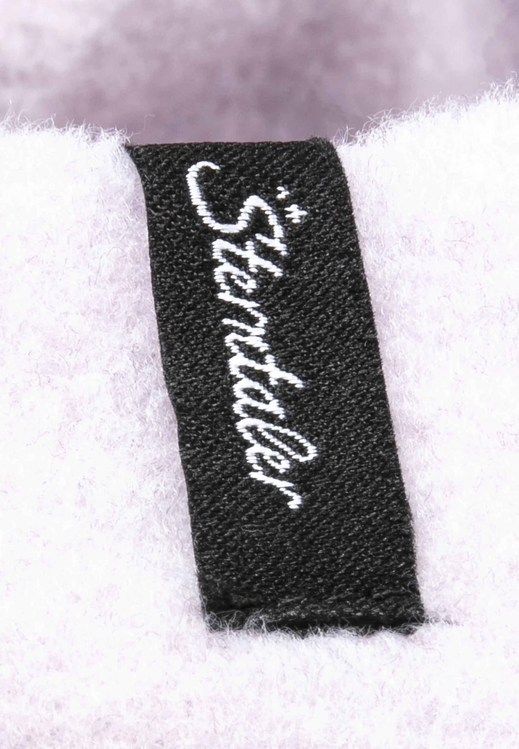 Multifunktionstuch aus Microfleece mit Logo-Patch