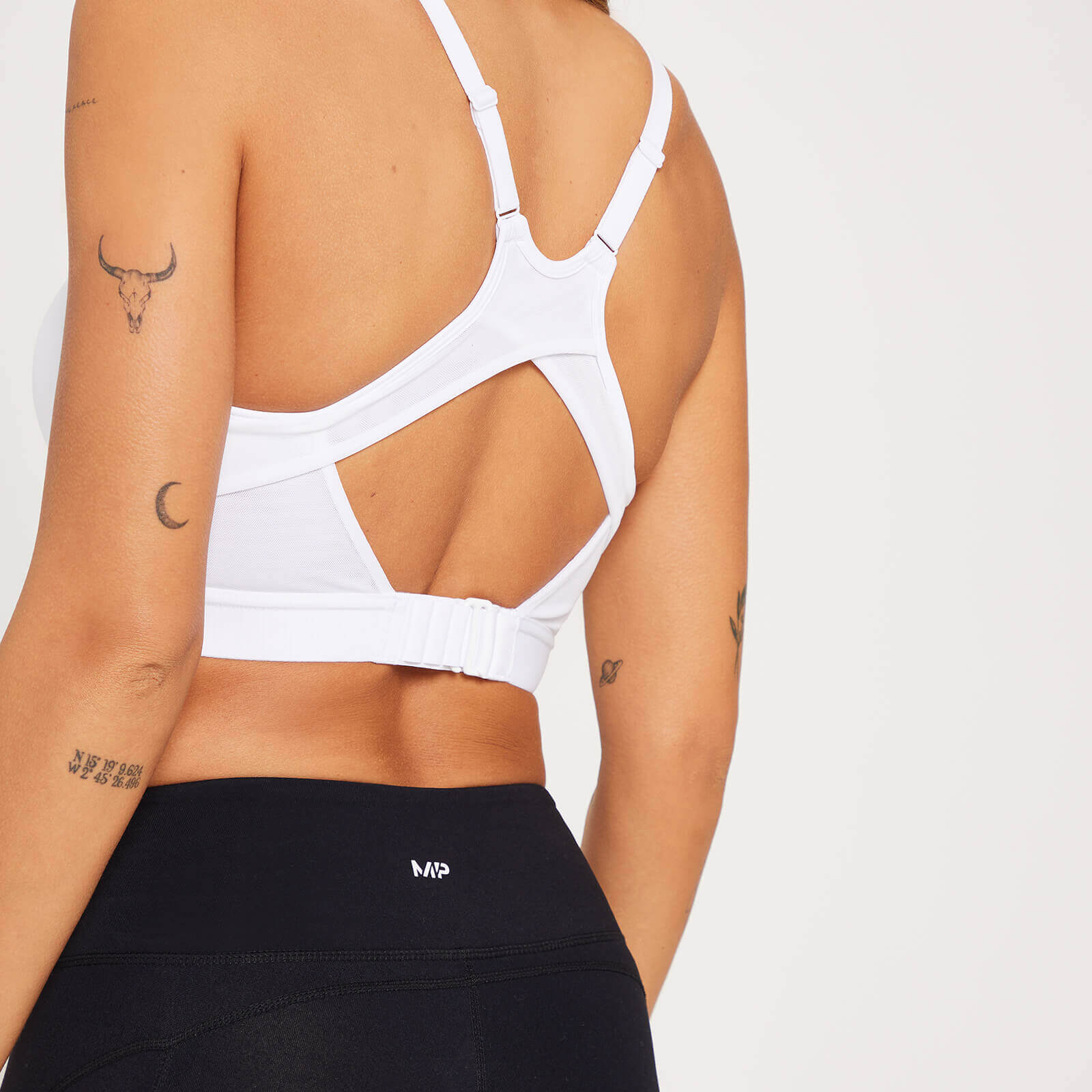 Brassière de sport à bonnets moulés et maintien supérieur MP pour femmes – Blanc