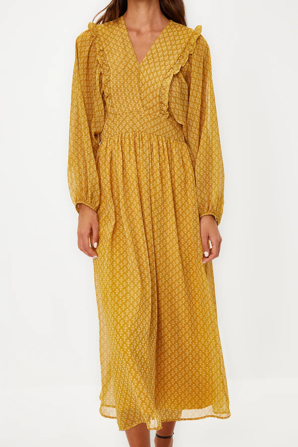 Trendyol Modest  Senfgelbes, minimal gemustertes, mit Chiffon gefüttertes Webkleid TCTSS24EB00035