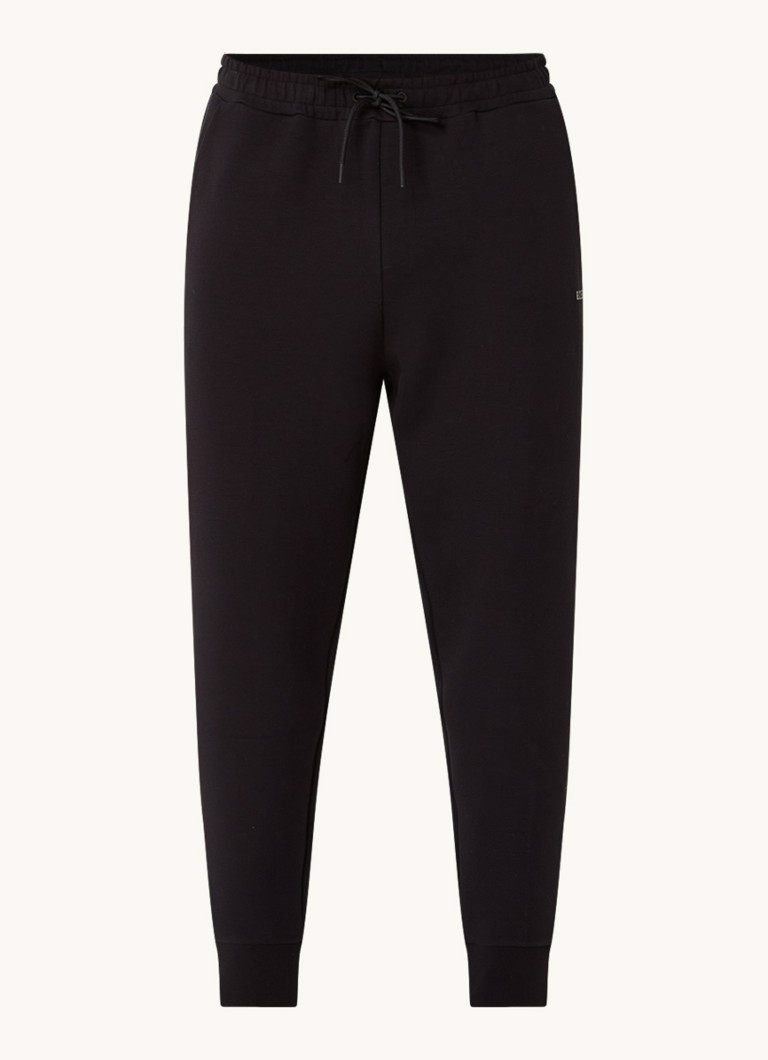 Calça de jogging HUGO BOSS Hadiko com corte afunilado e bolsos com costura.
