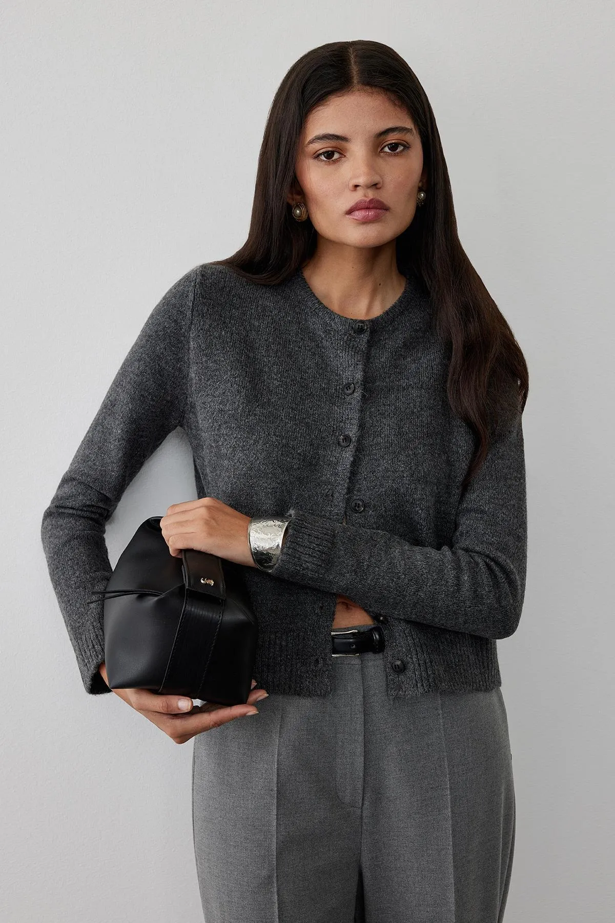 Suud Collection  Schwarze Archi-Minitasche aus Leder