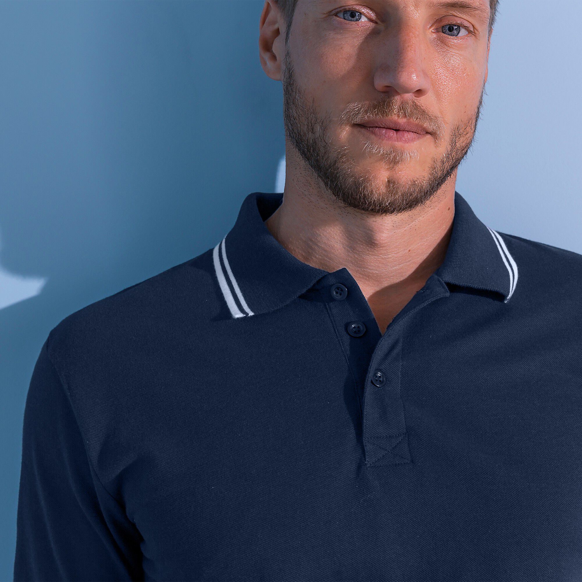 Polo uni maille piquée manches longues