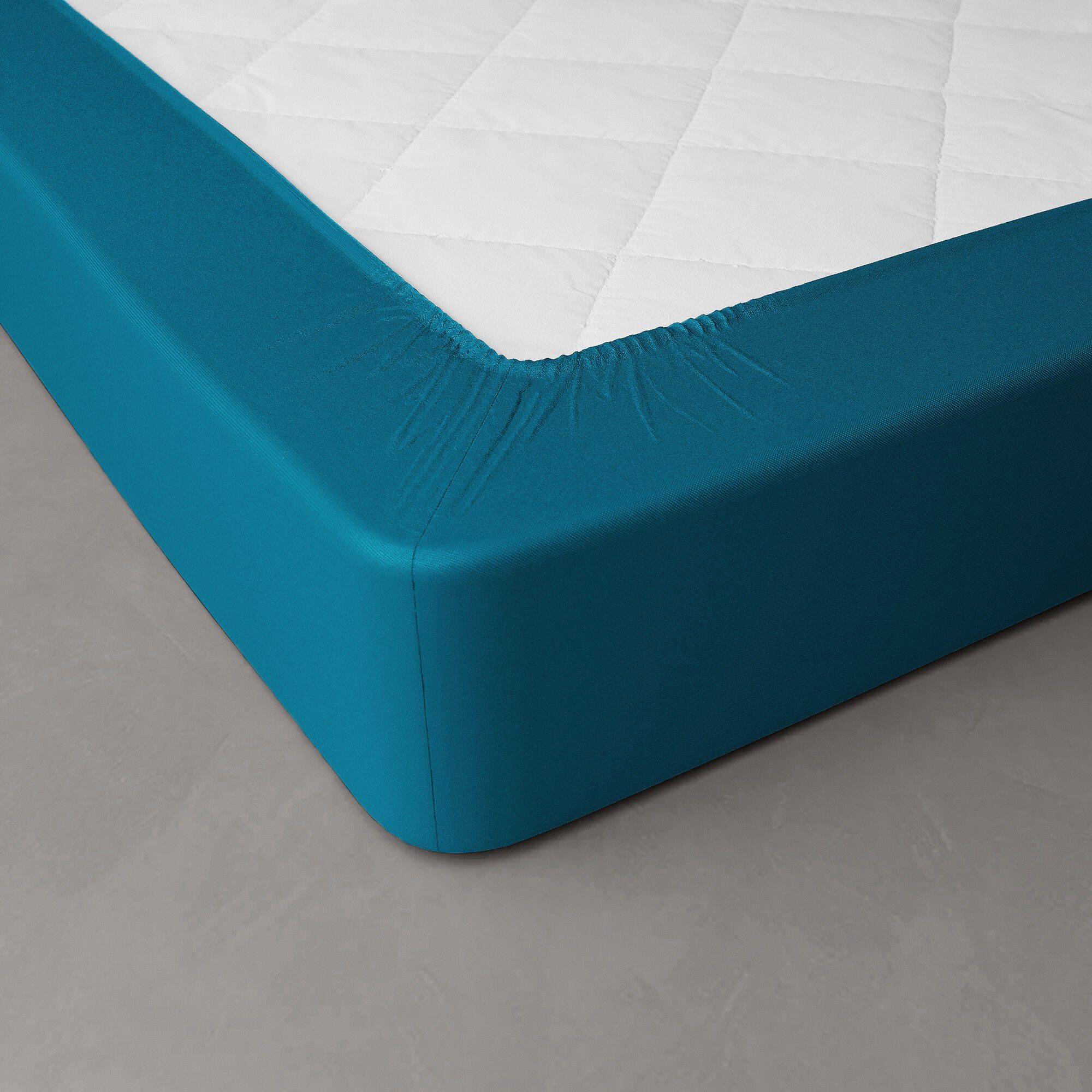 Drap-housse uni percale bonnets 40 cm