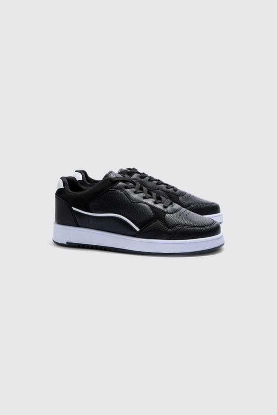 Schwarze Sneaker mit klobiger Sohle