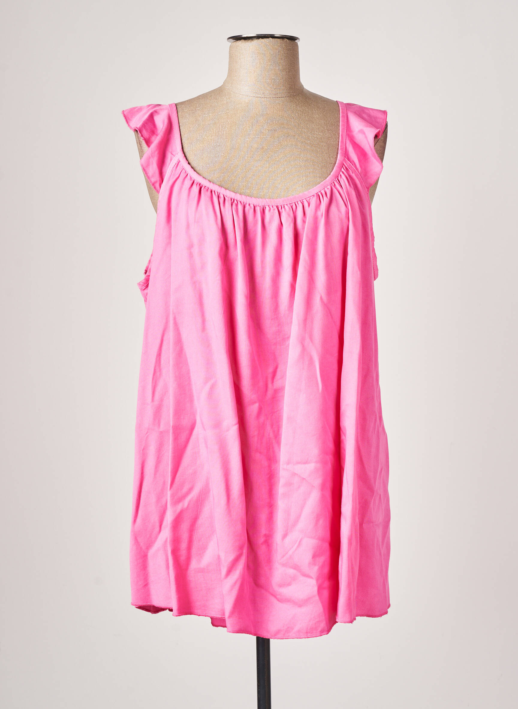 In April 1986 Tuniquemanchecourte Femme couleur rose