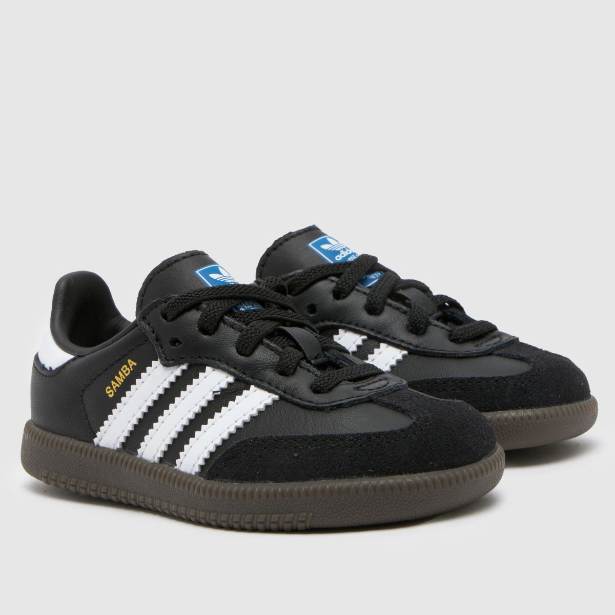 adidas fekete-fehér samba és kisgyermek edzőcipők
