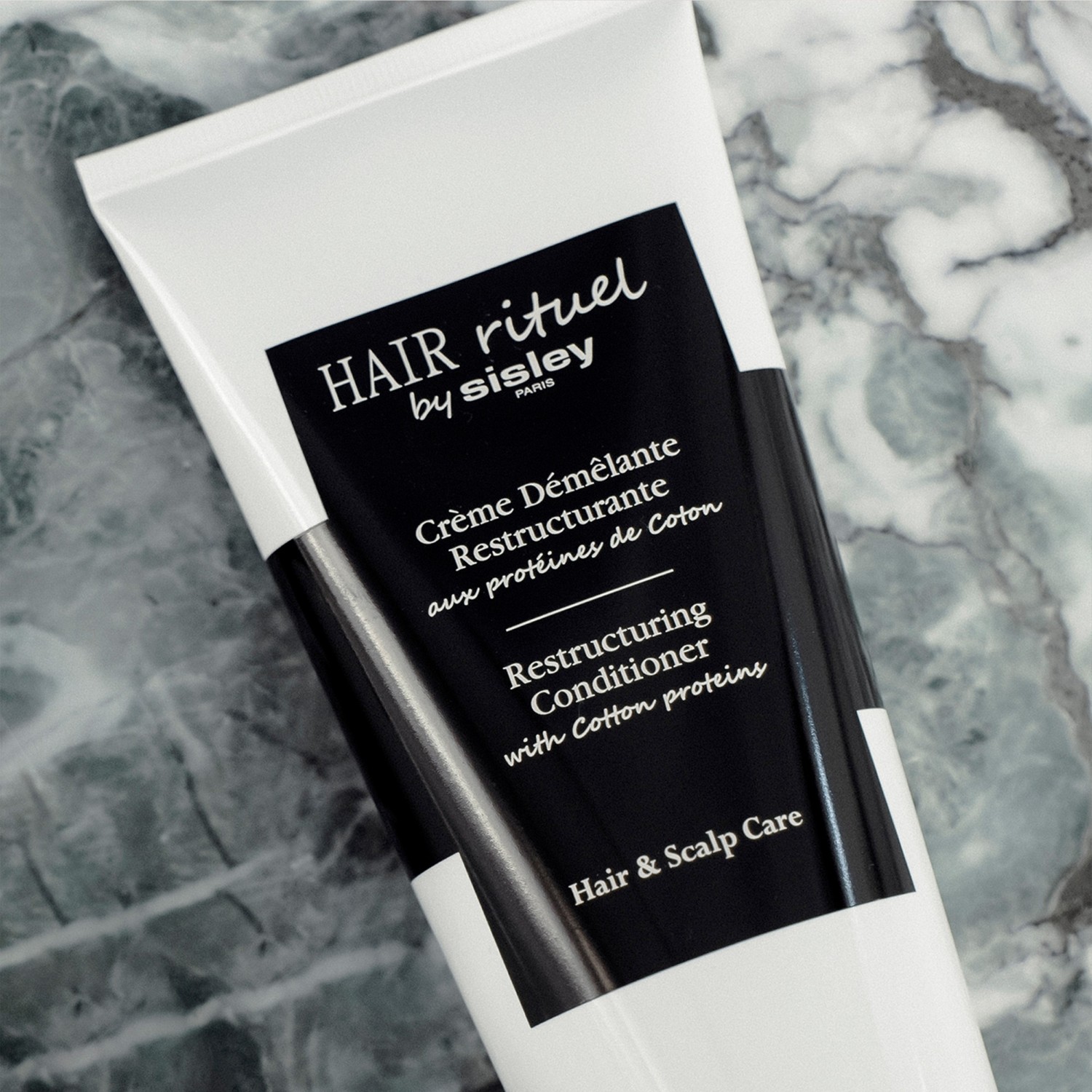 HAIR RITUAL BY SISLEY Restrukturering av floker med bomullsproteiner