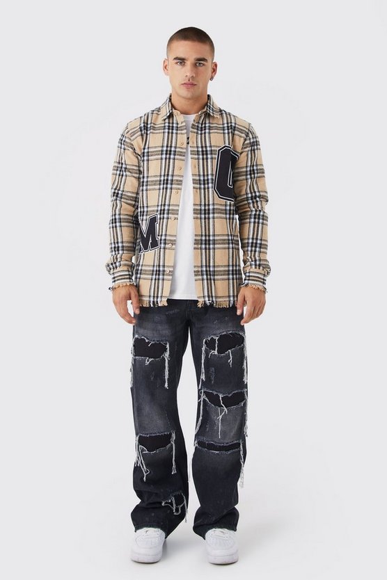 Lockere zerrissene Schlagjeans