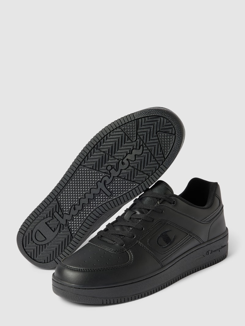 Sneaker mit Label-Detail in gelb
