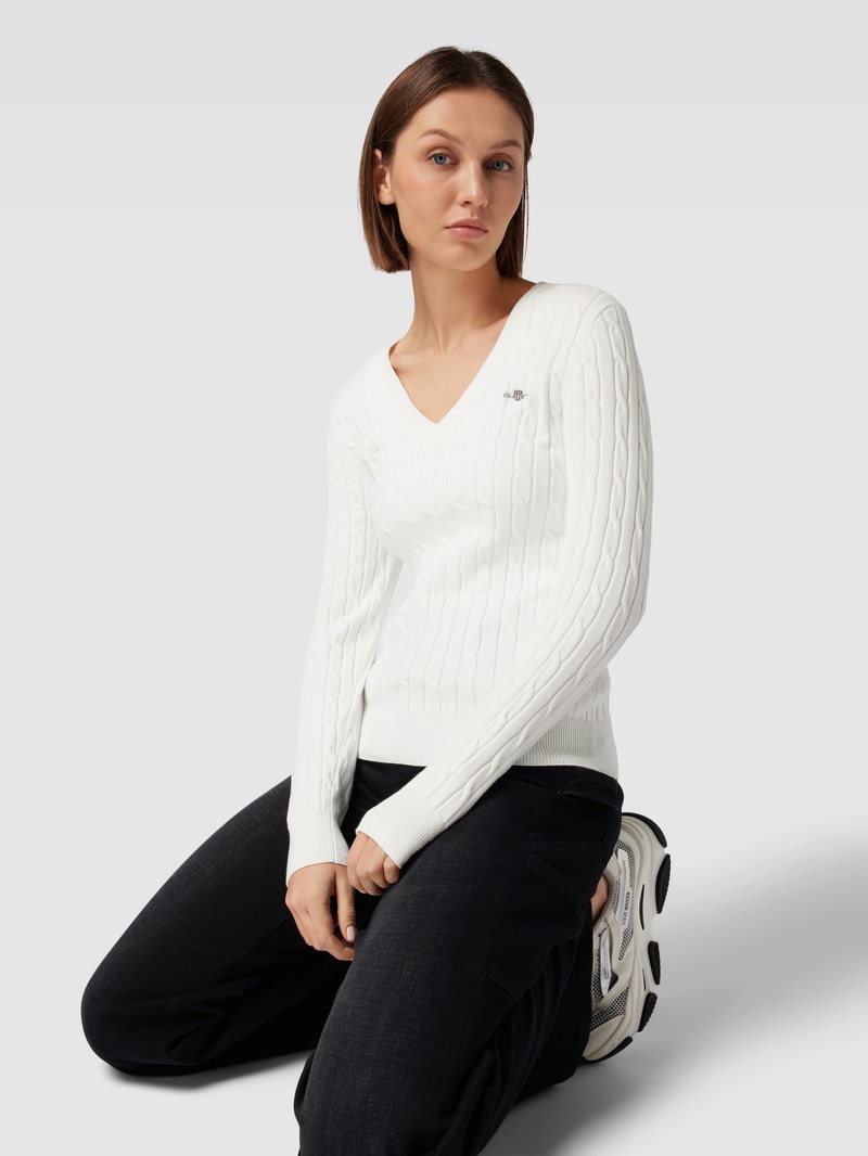 Strickpullover mit Zopfmuster in ecru