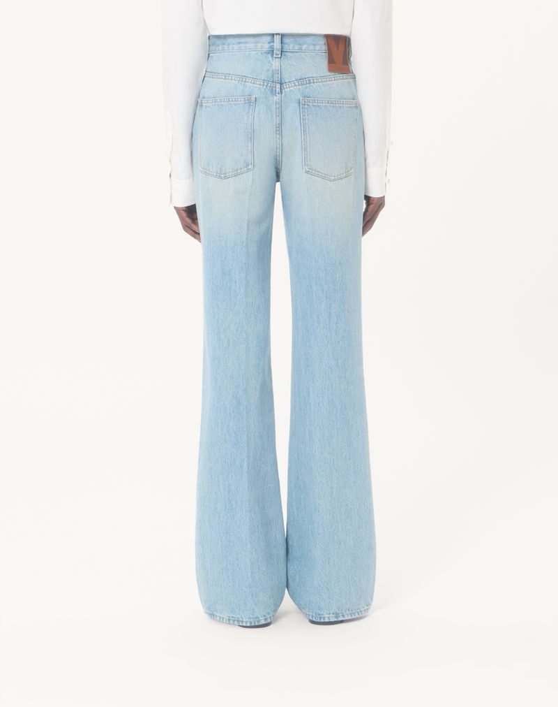 Calças jeans Valentino com botões dourados